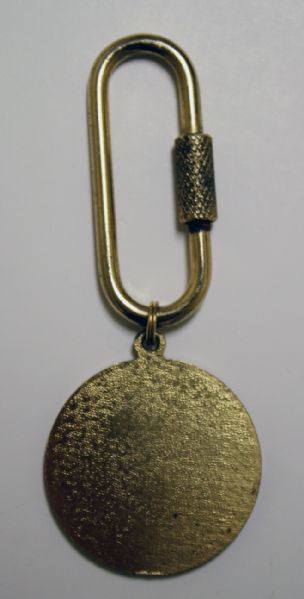 Golf Medal WGA 1899  has oval clip to hang it on something.