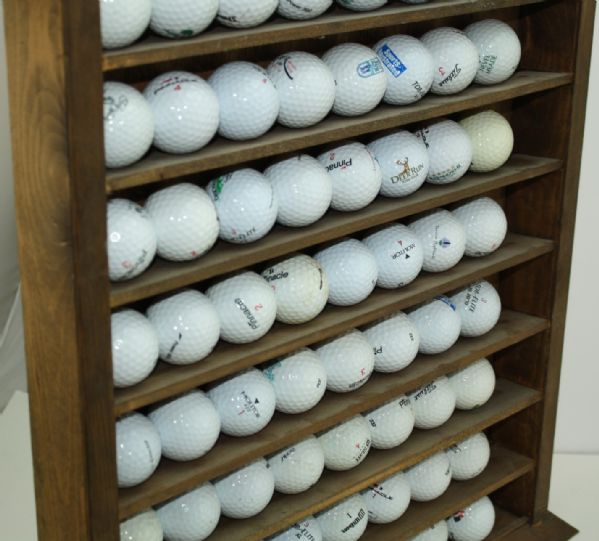 Wood Golf Display with Miscellaneaous Logo Golf Balls