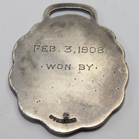 1908 Pinehurst Sterling Silver 'Ask The Man' Tin Whistles Medal