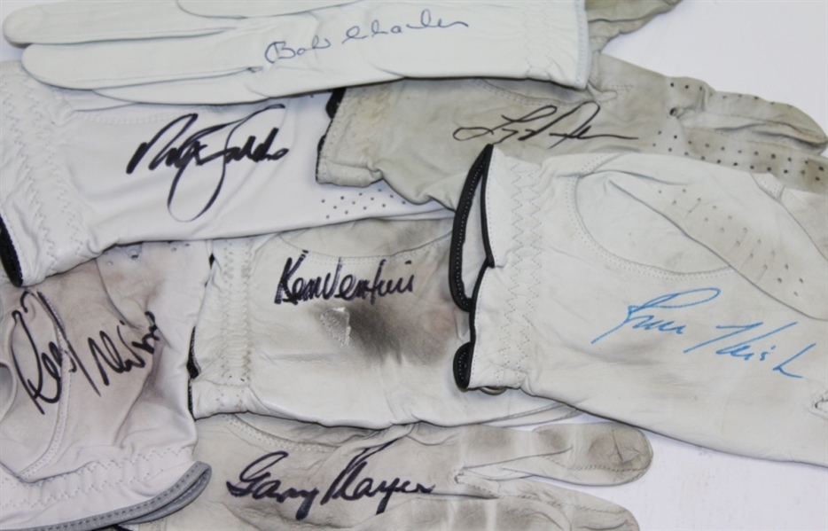 Lot of Seven Signed Golf Gloves Including Player, Faldo, Trevino, and others JSA ALOA