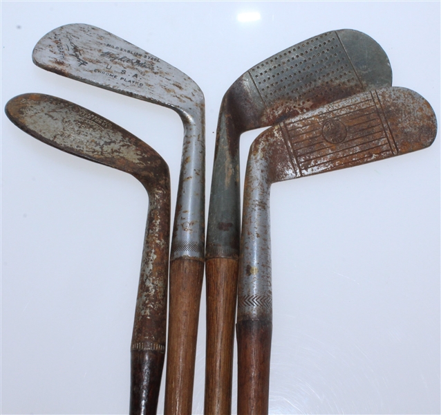 Four Classic Hickory Golf Clubs