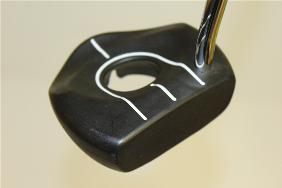 Group of Four Various Eccentric Golf Putters with Picker
