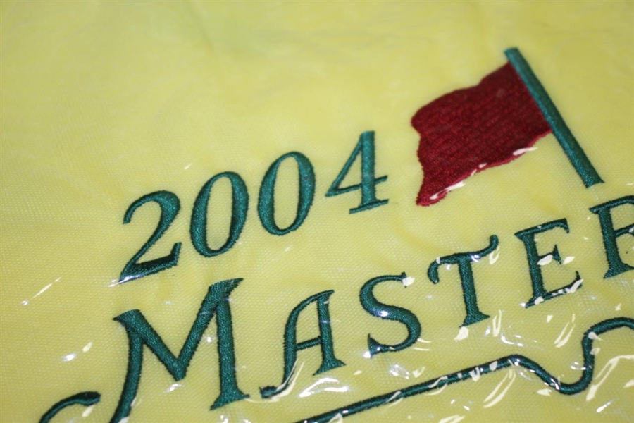 One 2004 & Four 2006 Masters Embroidered Flags in Original Plastic