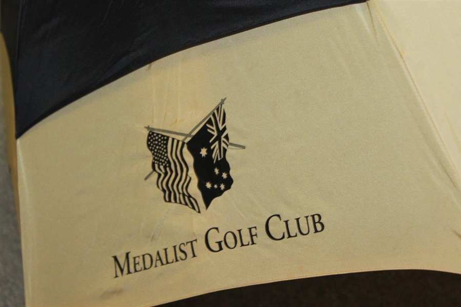 Greg Norman's Personal Used Medalist Golf Club Gold & Black Umbrella