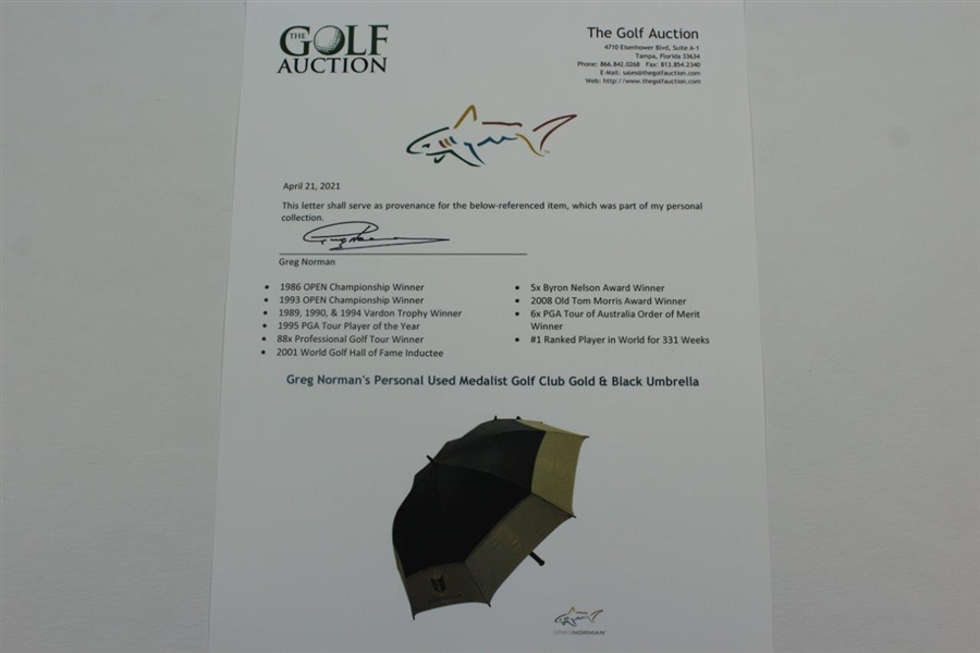 Greg Norman's Personal Used Medalist Golf Club Gold & Black Umbrella
