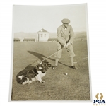 Mr. Gordon-Lockhart with Famous Prize Spaniel (Lord Reddy) Golf Ball Finder at Gleneagles Wire Photo