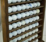 Wood Golf Display with Miscellaneaous Logo Golf Balls