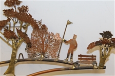 Unique Copper/Brass Golf Wall Structure Tee Shot by Golfer in Knickers with Onlookers
