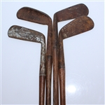 Four Classic Hickory Golf Clubs