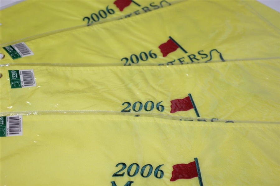 One 2004 & Four 2006 Masters Embroidered Flags in Original Plastic