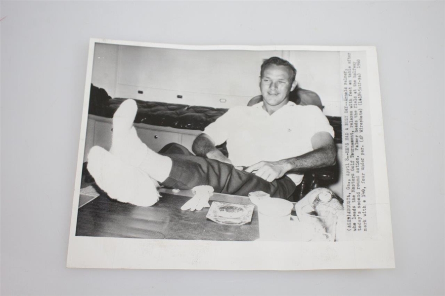 1960 Wire Photo of Arnold Palmer Resting Feet on Desk at Masters