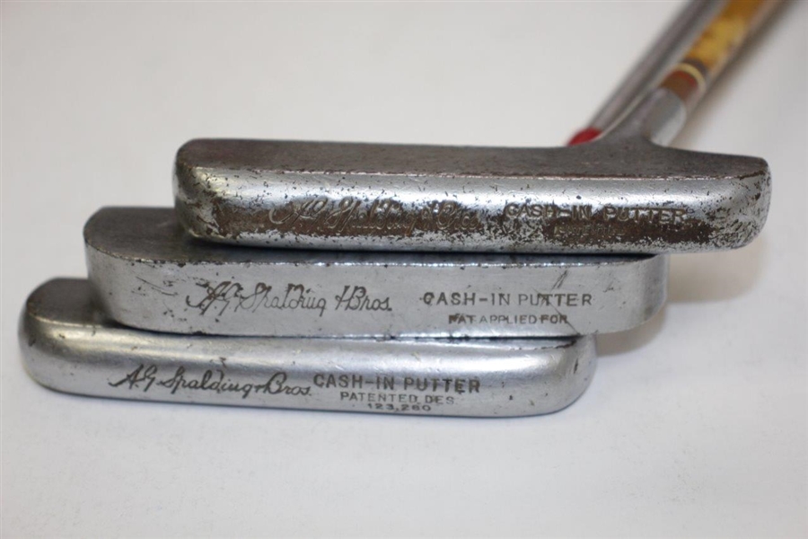 Three A.G. Spalding & Bros. Cash-In Putters