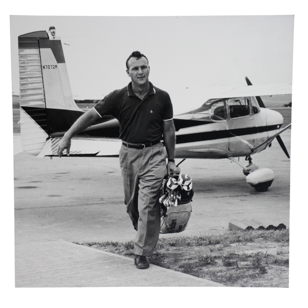 Arnold Palmer B&W 16x16 Matted Photo Carrying Golf Bag with Clubs Leaving Plane