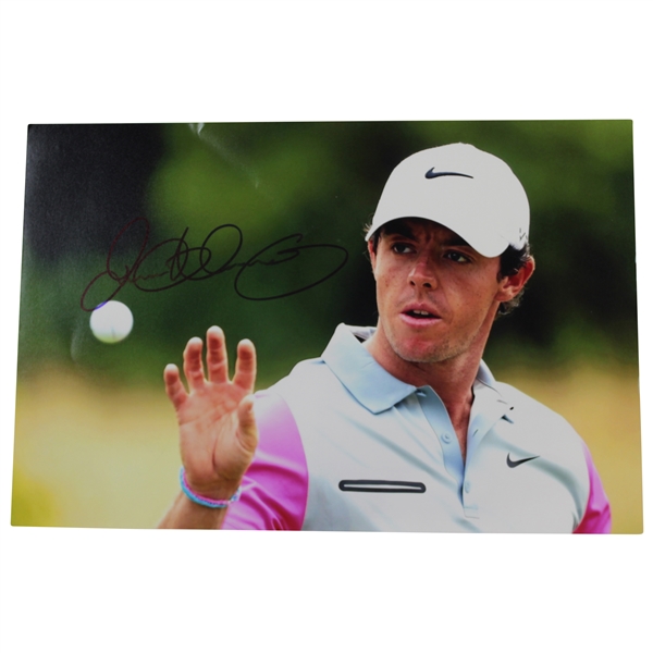 Rory McIlroy Signed Photo at The 2014 Open at Royal Liverpool Eyeing The Ball JSA ALOA