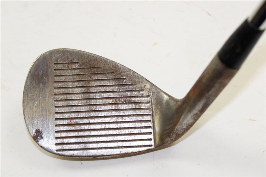 Greg Norman's Personal Used Unmarked Pitching Wedge with Lead Tape