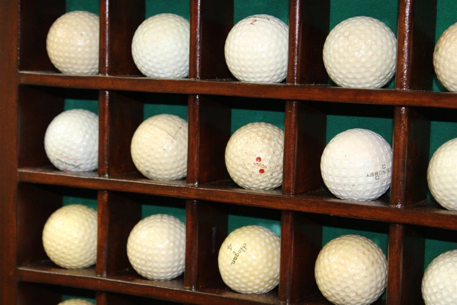 Forty-Eight (48) Dimple & Mesh Pattern Golf Balls in Wood Display Case