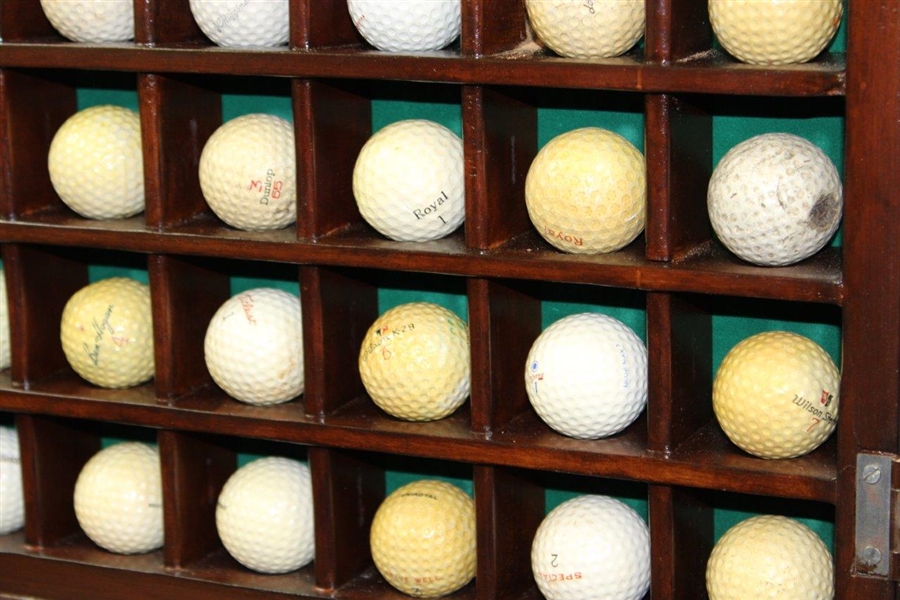 Forty-Eight (48) Dimple & Mesh Pattern Golf Balls in Wood Display Case