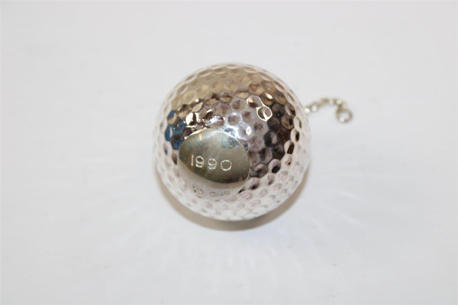 Chi-Chi Rodriguez's 1990 Garrard Jewelers Silver Golf Ball with Chain in Original Box
