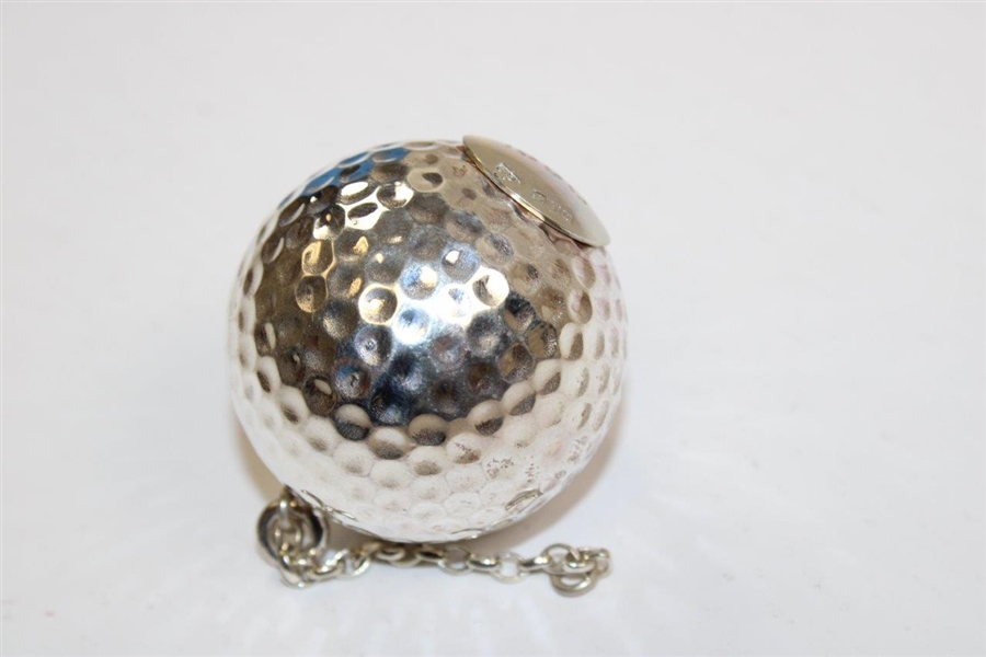 Chi-Chi Rodriguez's 1990 Garrard Jewelers Silver Golf Ball with Chain in Original Box