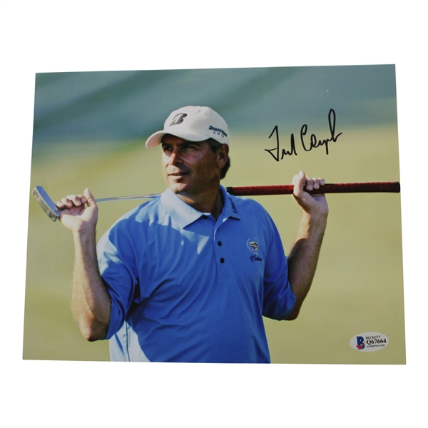 Fred Couples Signed Photo in Blue Cadillac Shirt Holding Putter BECKETT #Q67664