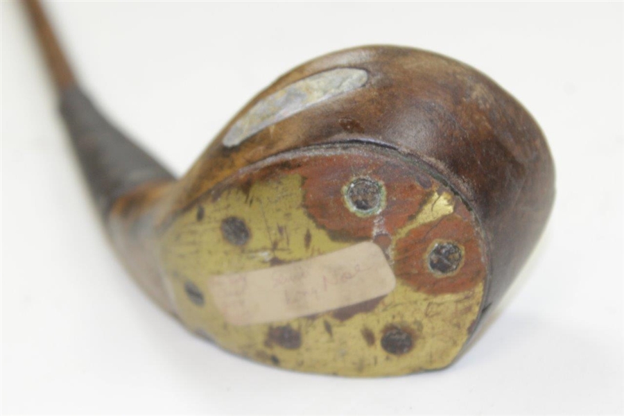 Vintage Scared Head Bulger Mashie with Brass Sole Plate