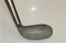 Circa 1890's Spalding Concave Face Rut Niblick with S.M. Co. Shaft Stamp