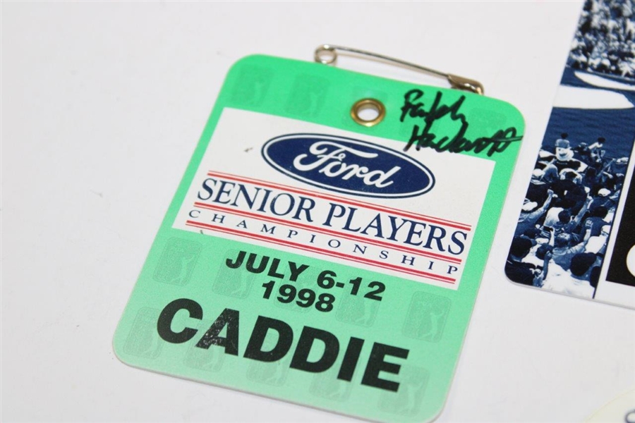 Four (4) Ralph Hackett Signed Senior Tour Caddie Badges 