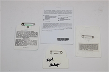 Four (4) Ralph Hackett Signed Senior Tour Caddie Badges 
