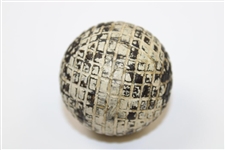 Late 1880's to 1895 Molded Mesh Line Cut Gutty Golf Ball