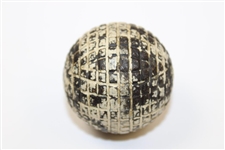 Late 1880's to 1895 Molded Mesh Line Cut Gutty Golf Ball