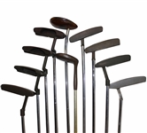 Ten (10) Various Putters Including Eight (8) Assorted PING Putters, a Brass Playboy & a Woodie Putter