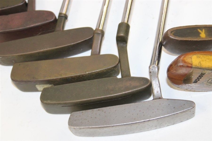 Ten (10) Various Putters Including Eight (8) Assorted PING Putters, a Brass Playboy & a Woodie Putter