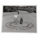 Arnold Palmer at Latrobe 1985 Phil Sheldon Photo w/Golf Bag & Clubs Circled Around Him For Putting Book