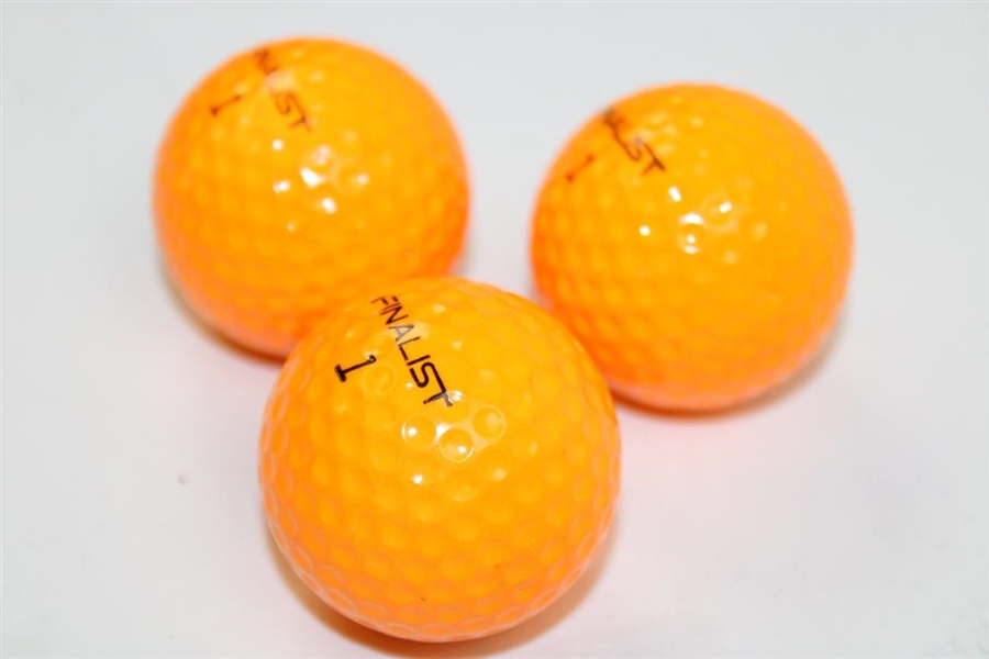 Three (3) Orange 'Finalist' Logo Golf Balls