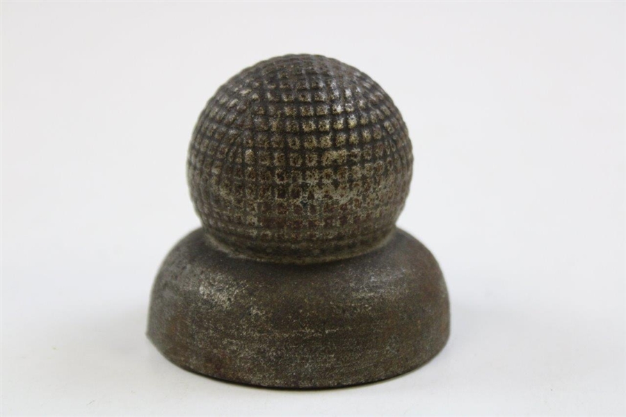 Vintage Cast Iron Advertising Paperweight Of A Gutty Ball On A Sand Tee The Ball Has Fore On One Side And Below 