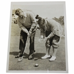 Gene Sarazen Lining Up A Putt With A Fellow Golfer Press Photo