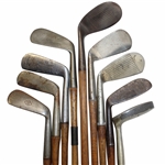 9 Wood Shaft Clubs Including Putters (3), LH Jigger, Niblick, Mashie (3) & Mid Iron