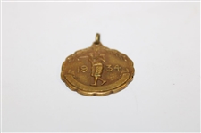 1934 Post-Swing Golfer Embossed Medallion