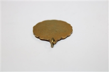 1934 Post-Swing Golfer Embossed Medallion