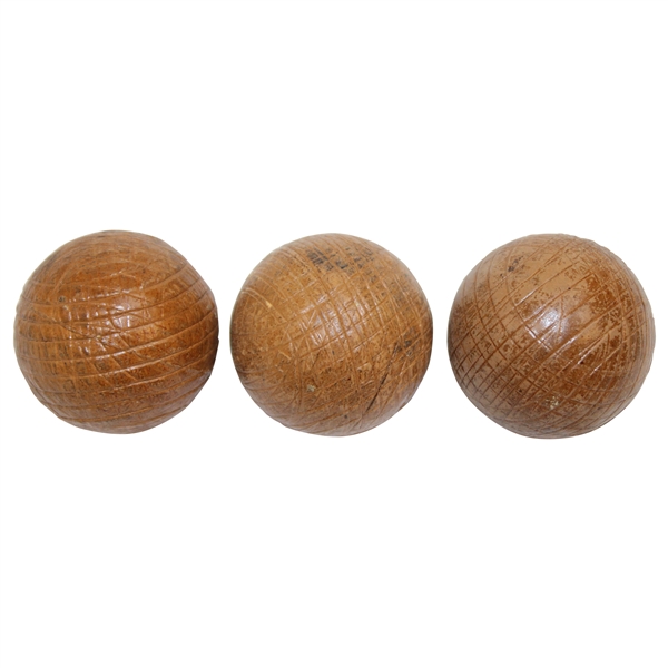 Three Unused Brown Rubber Score Guttie Style Golf Balls