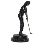 Statue Of Female Golfer Lining Up An Iron Shot 