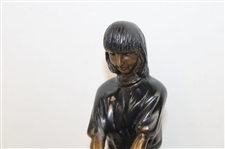 Statue Of Female Golfer Lining Up An Iron Shot 