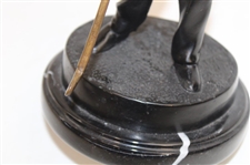 Statue Of Female Golfer Lining Up An Iron Shot 