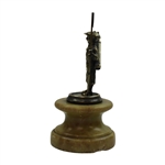Older Uncommon Statue Of A Caddy Holding Flag On Marble Or Alabaster Type Plinth