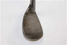 Greg Norman's Personal Used Unmarked Wedge with Lead Tape on Back