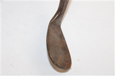 Greg Norman's Personal Unmarked Lead Tape Wedge