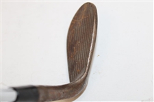 Greg Norman's Personal Unmarked Lead Tape Wedge