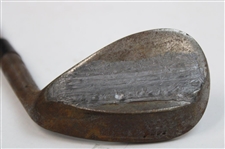 Greg Norman's Personal Unmarked Lead Tape Wedge