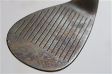 Greg Norman's Personal Unmarked Lead Tape Wedge