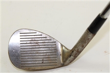 Greg Norman's Personal Used Unmarked Pitching Wedge with Lead Tape